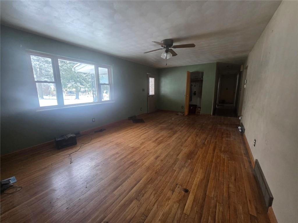 429 Paris Colliers Road Burgettstown, PA 15021 - Photo 5 of 25 wooden floor in an empty room with a window