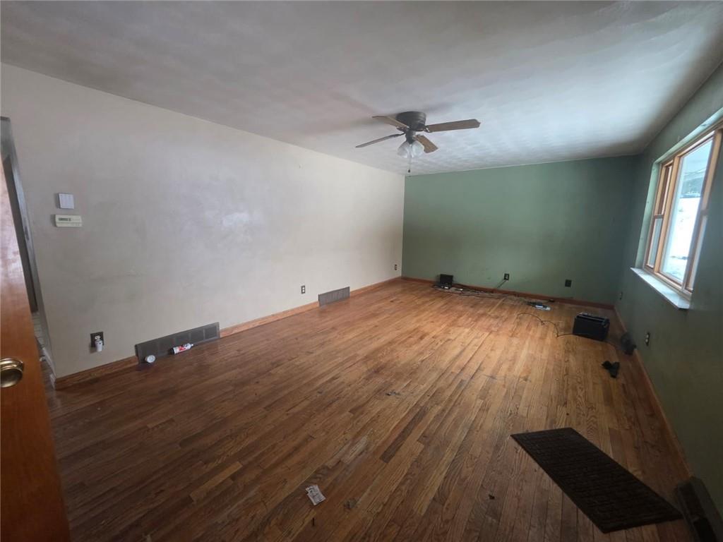429 Paris Colliers Road Burgettstown, PA 15021 - Photo 6 of 25 wooden floor in an empty room