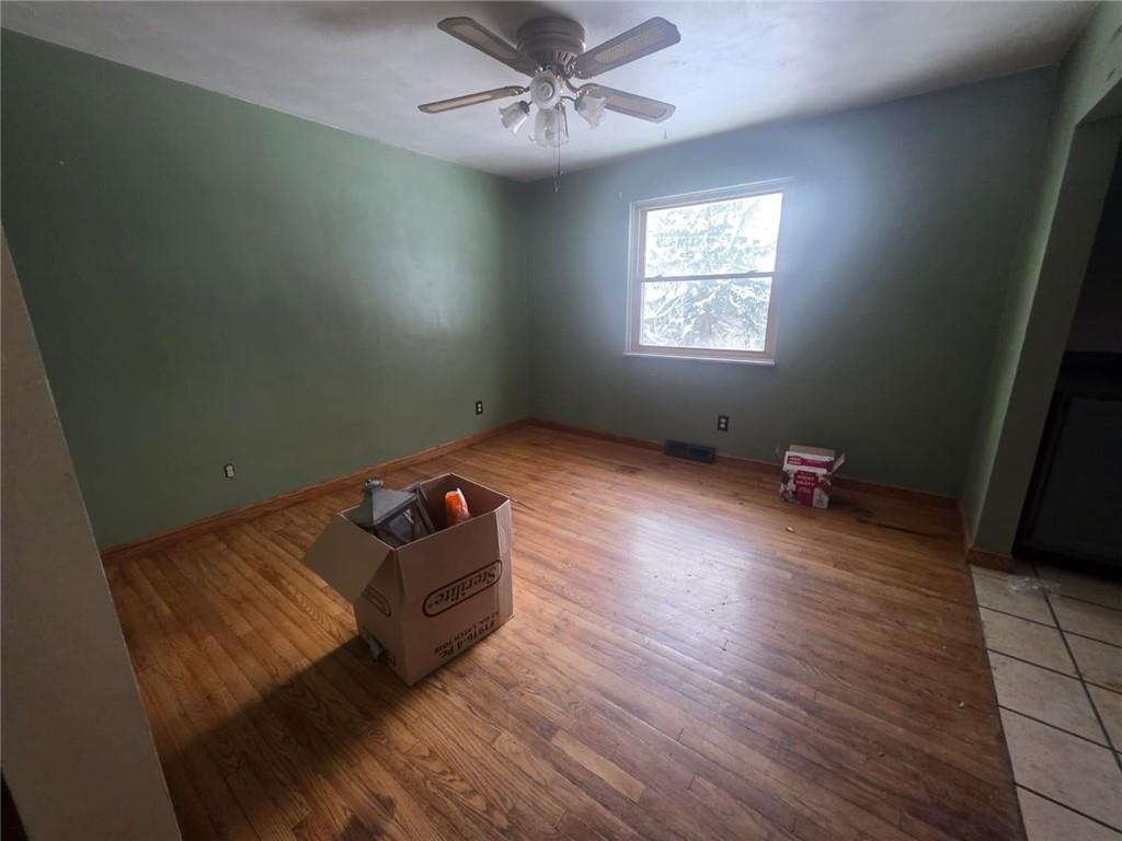 429 Paris Colliers Road Burgettstown, PA 15021 - Photo 7 of 25 wooden floor & windows in a room