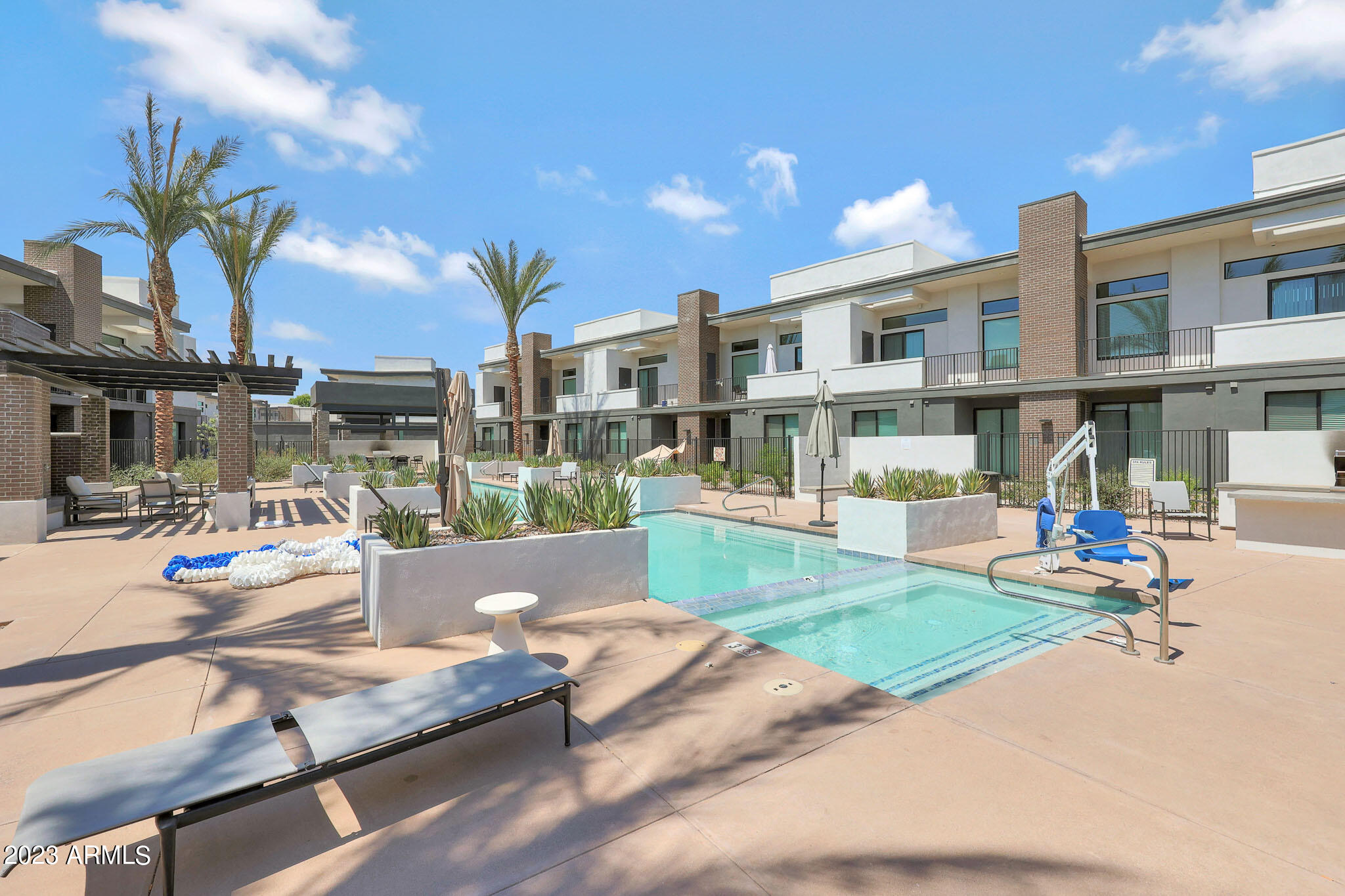 a view of a house with patio and a patio