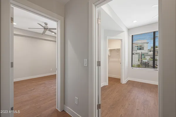 a view of an empty room with a window
