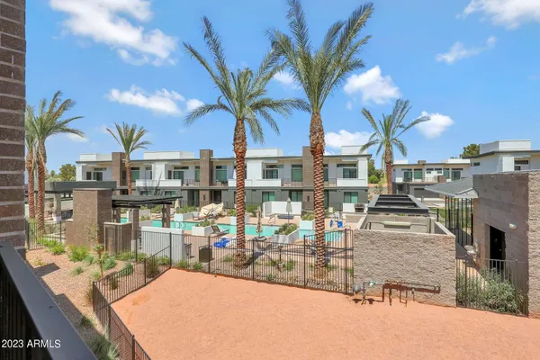 a view of a patio with swimming pool