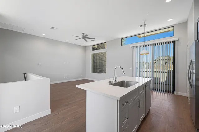 a view of kitchen with living room
