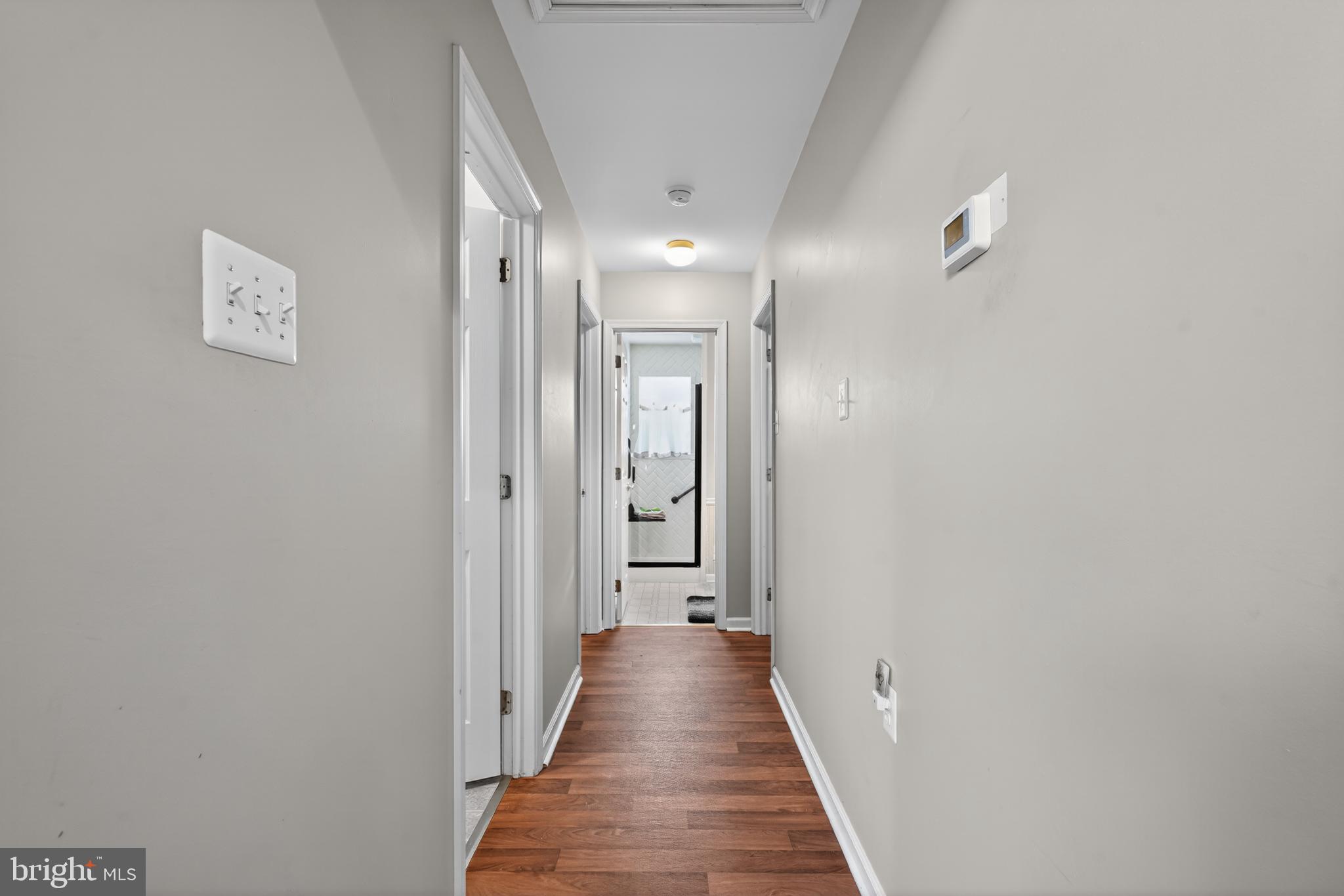 623 Monarda Trail Mullica Hill, NJ 08062 - Photo 18 of 35 Inviting hallway with warm wood accents.