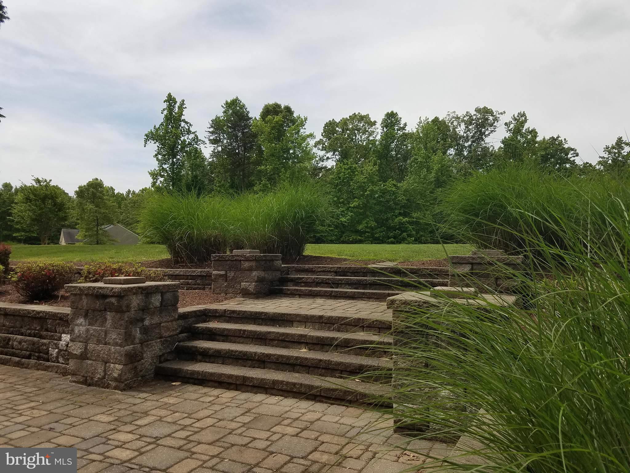 82 Millbrook Road Stafford, VA 22554 - Photo 30 of 30 Custom Stone Paver Tiered Steps to flat Front yard