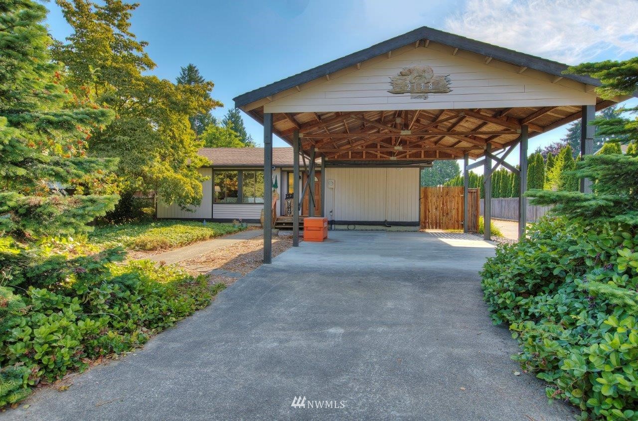 2138 Union Avenue Northeast Renton, WA 98059 - Photo 23 of 23 a view of a house with backyard and garden