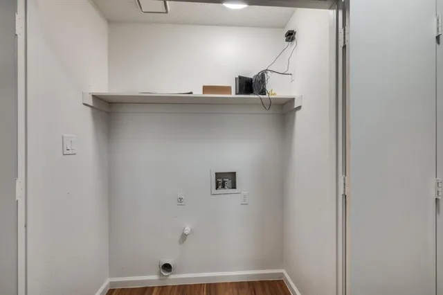 a view of storage and utility room with washer and dryer