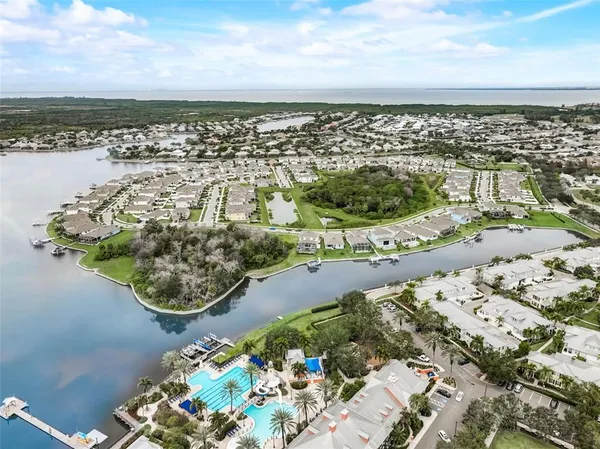 a front view of house with a garden
