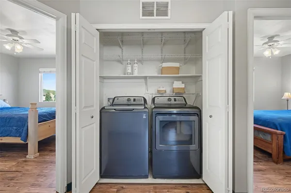 a view of a kitchen from the hallway