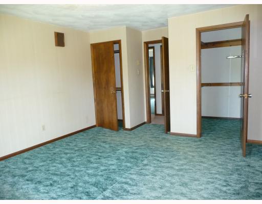 10440 Five Points Road Home, PA 15747 - Photo 8 of 12 Master Bedroom. Large master bedroom has lighted walk-in closet and regular closet. Hook ups for TV and phone. Tiled 3/4 bath includes shower.
