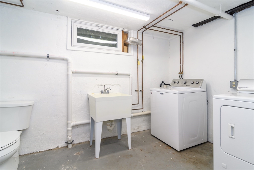32 Harvard Street Natick, MA 01760 - Photo 19 of 24 a utility room with dryer and washer
