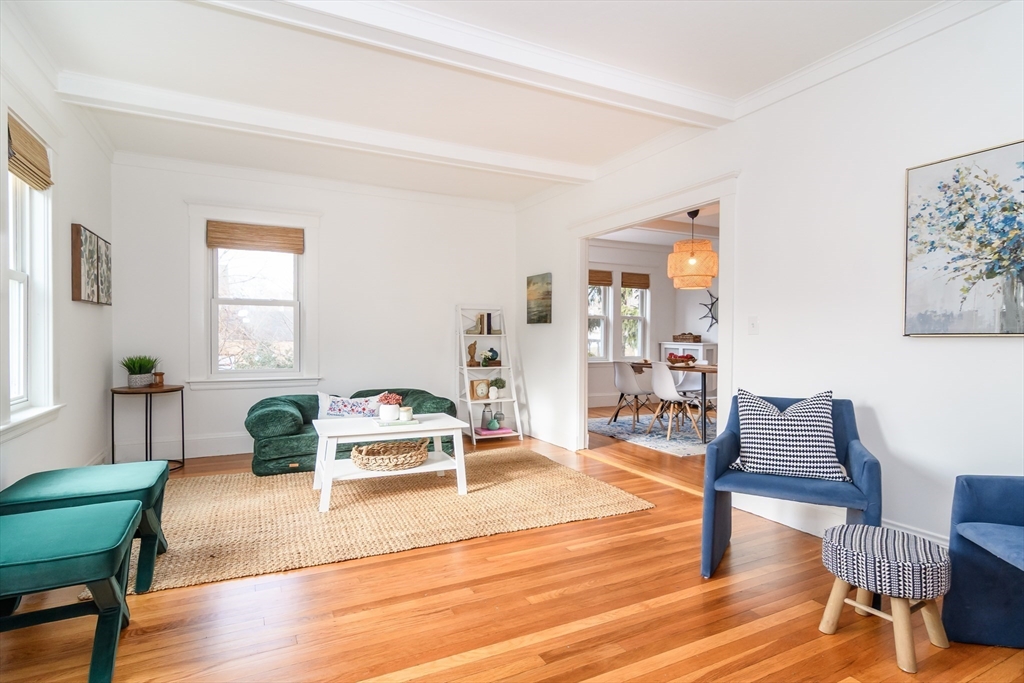 32 Harvard Street Natick, MA 01760 - Photo 6 of 24 a living room with furniture and a wooden floor