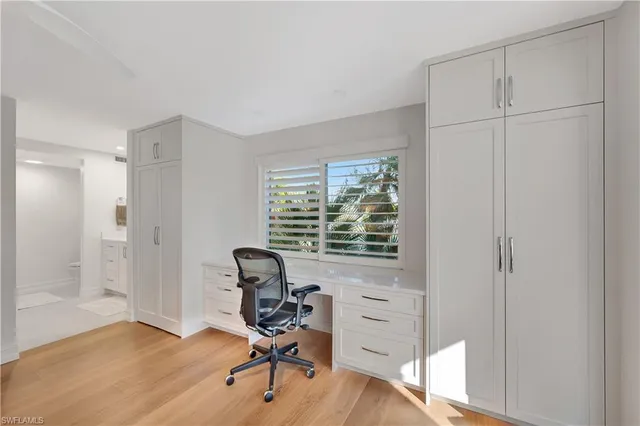 a bathroom with a sink double vanity and a mirror