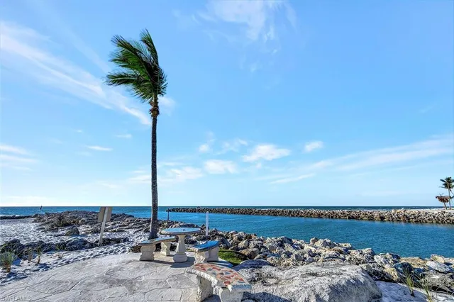 a view of a swimming pool with a lounge chairs
