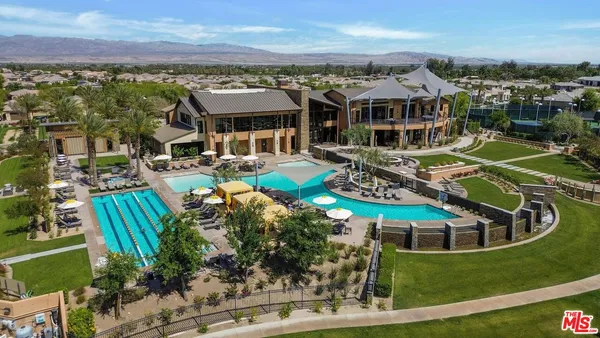 a view of an empty room and a window