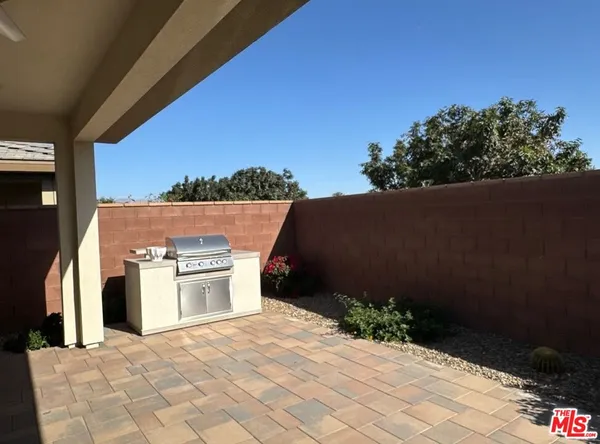 a view of a flower arrangement in backyard