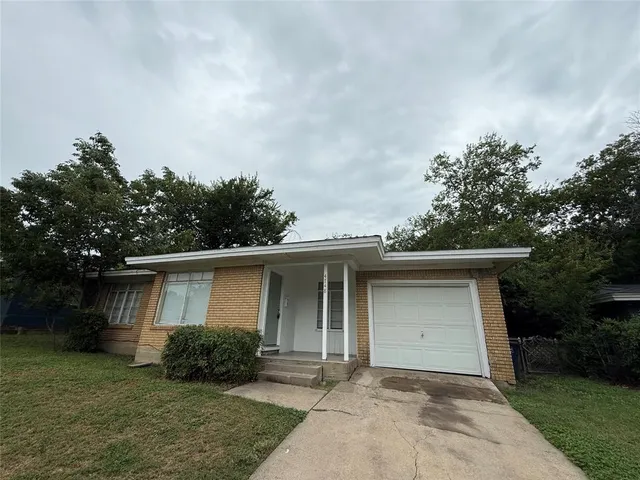 front view of house with a yard