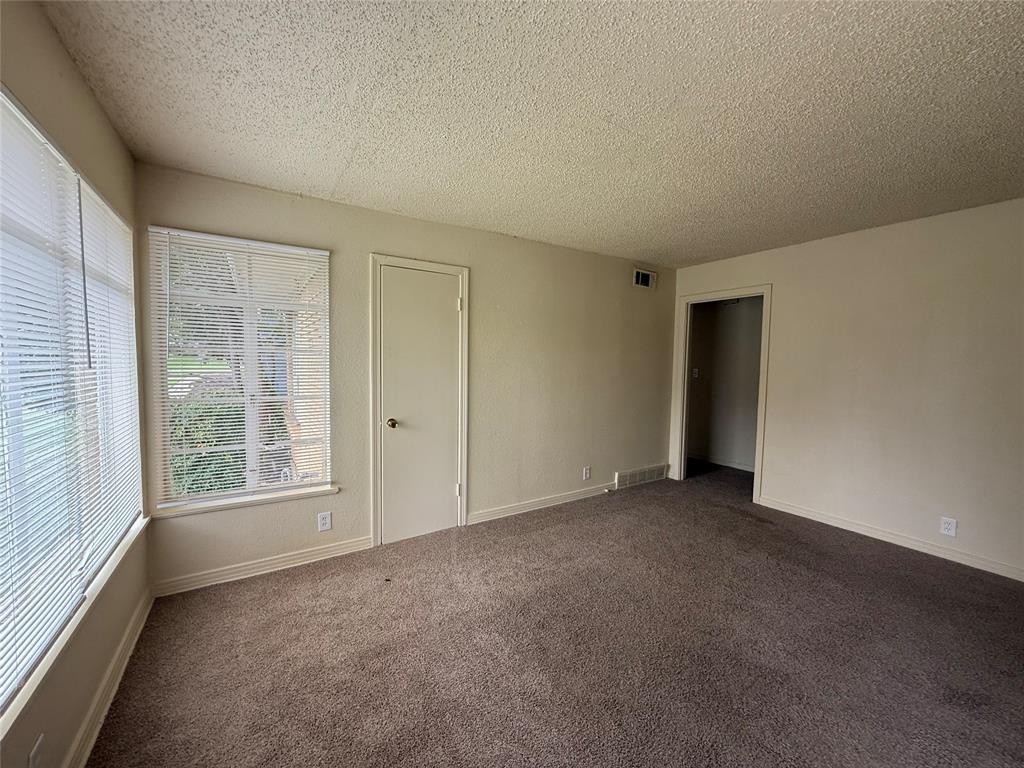 4748 South Ridge Terrace Fort Worth, TX 76133 - Photo 6 of 15 an empty room with windows