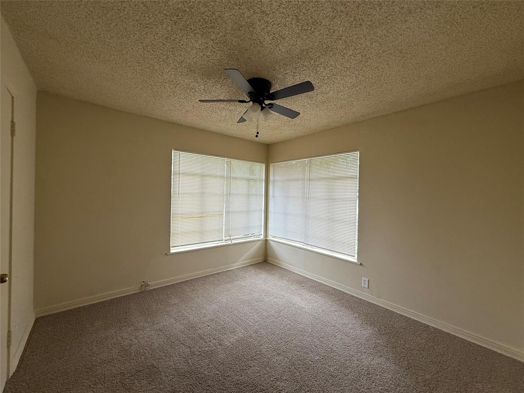4748 South Ridge Terrace Fort Worth, TX 76133 - Photo 7 of 15 a view of an empty room with a window