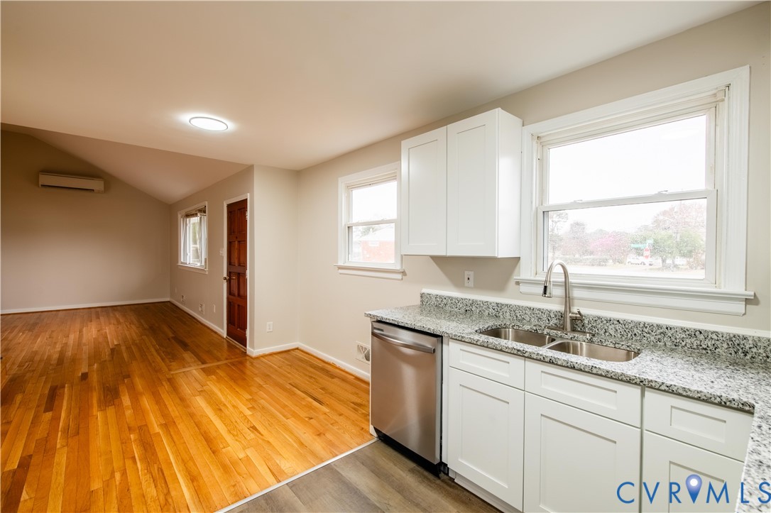 2600 Hungary Road Henrico, VA 23228 - Photo 13 of 43 a kitchen with a sink wooden floor and window