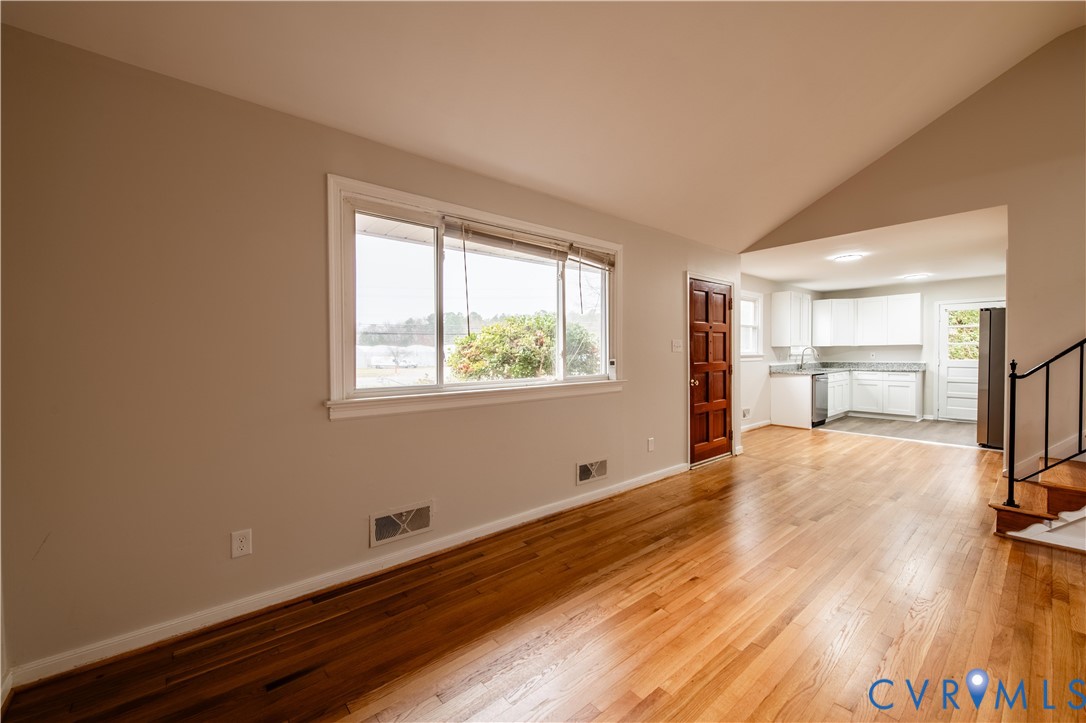 2600 Hungary Road Henrico, VA 23228 - Photo 18 of 43 a view of empty room with wooden floor and fan