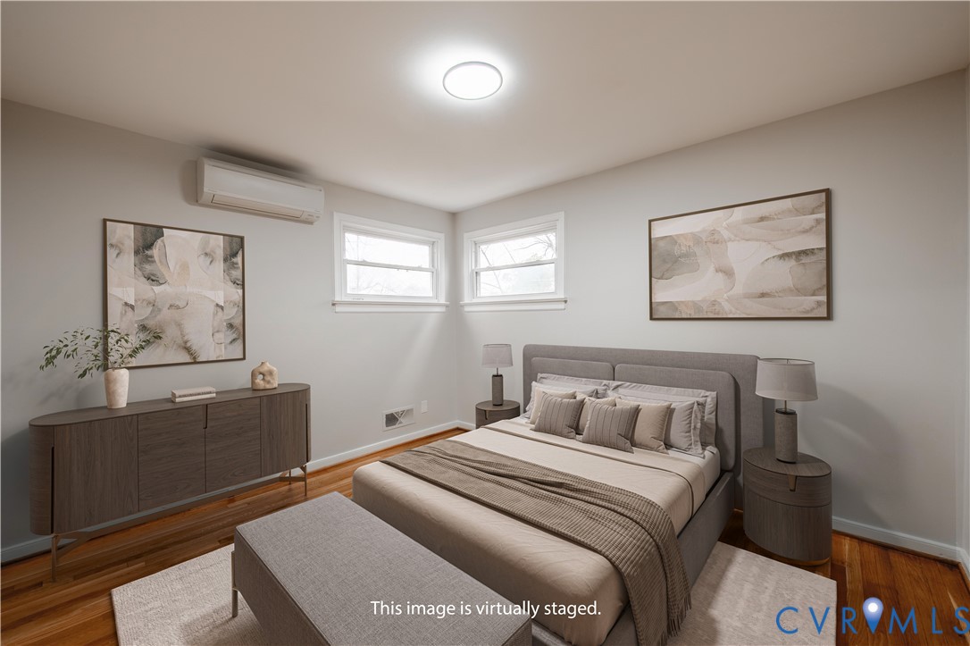 2600 Hungary Road Henrico, VA 23228 - Photo 23 of 43 a bedroom with a bed and a desk