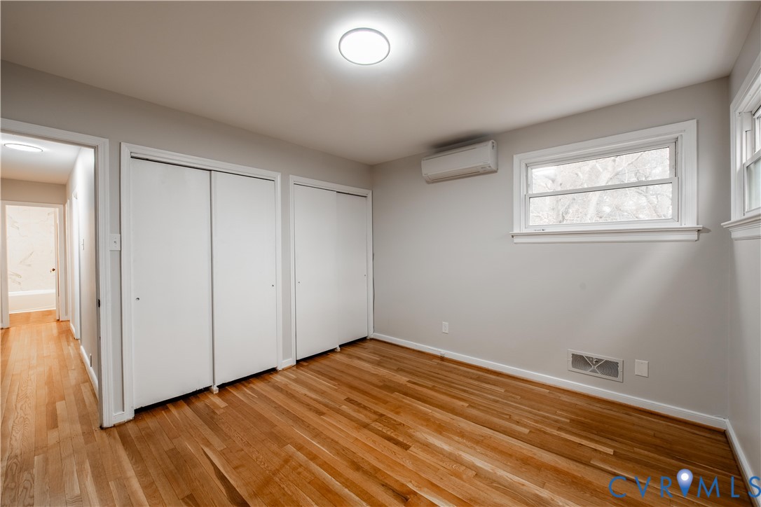 2600 Hungary Road Henrico, VA 23228 - Photo 28 of 43 wooden floor in an empty room with a window