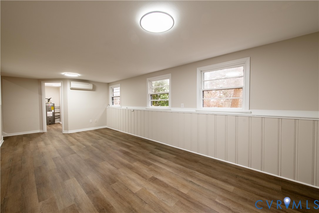 2600 Hungary Road Henrico, VA 23228 - Photo 36 of 43 an empty room with wooden floor and windows