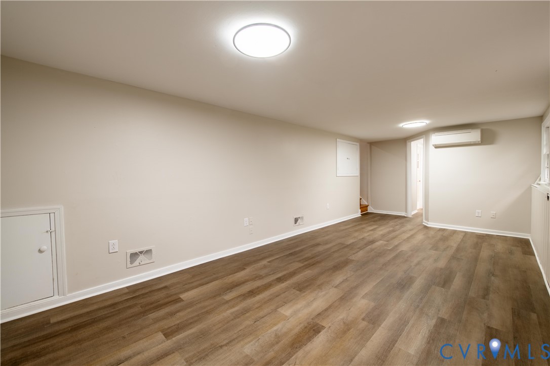 2600 Hungary Road Henrico, VA 23228 - Photo 39 of 43 a view of empty room with wooden floor