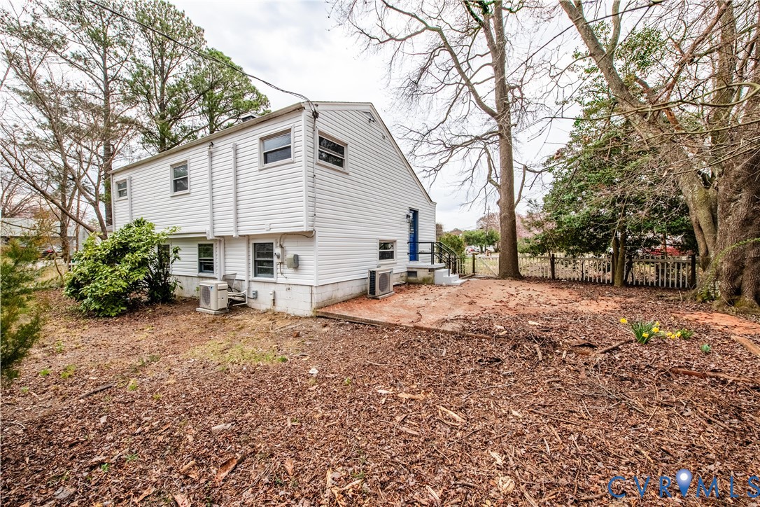 2600 Hungary Road Henrico, VA 23228 - Photo 7 of 43 a view of a house with a yard covered in snow