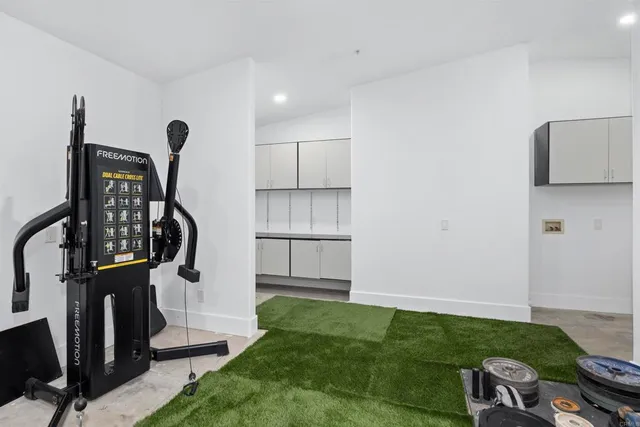 a view of a livingroom with furniture and entryway