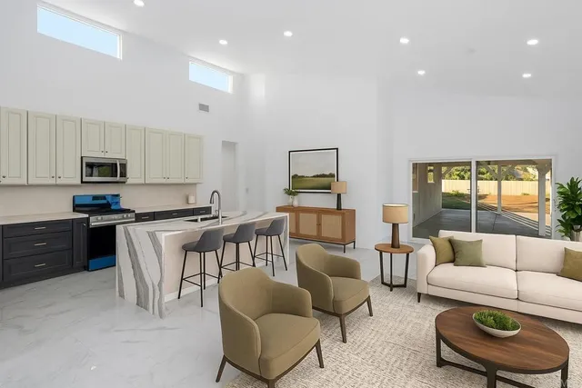 a living room with furniture and a window