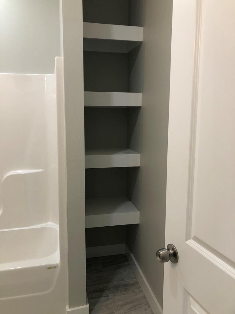 52 Magnolia Street Niceville, FL 32578 - Photo 13 of 16 a bathroom with a window