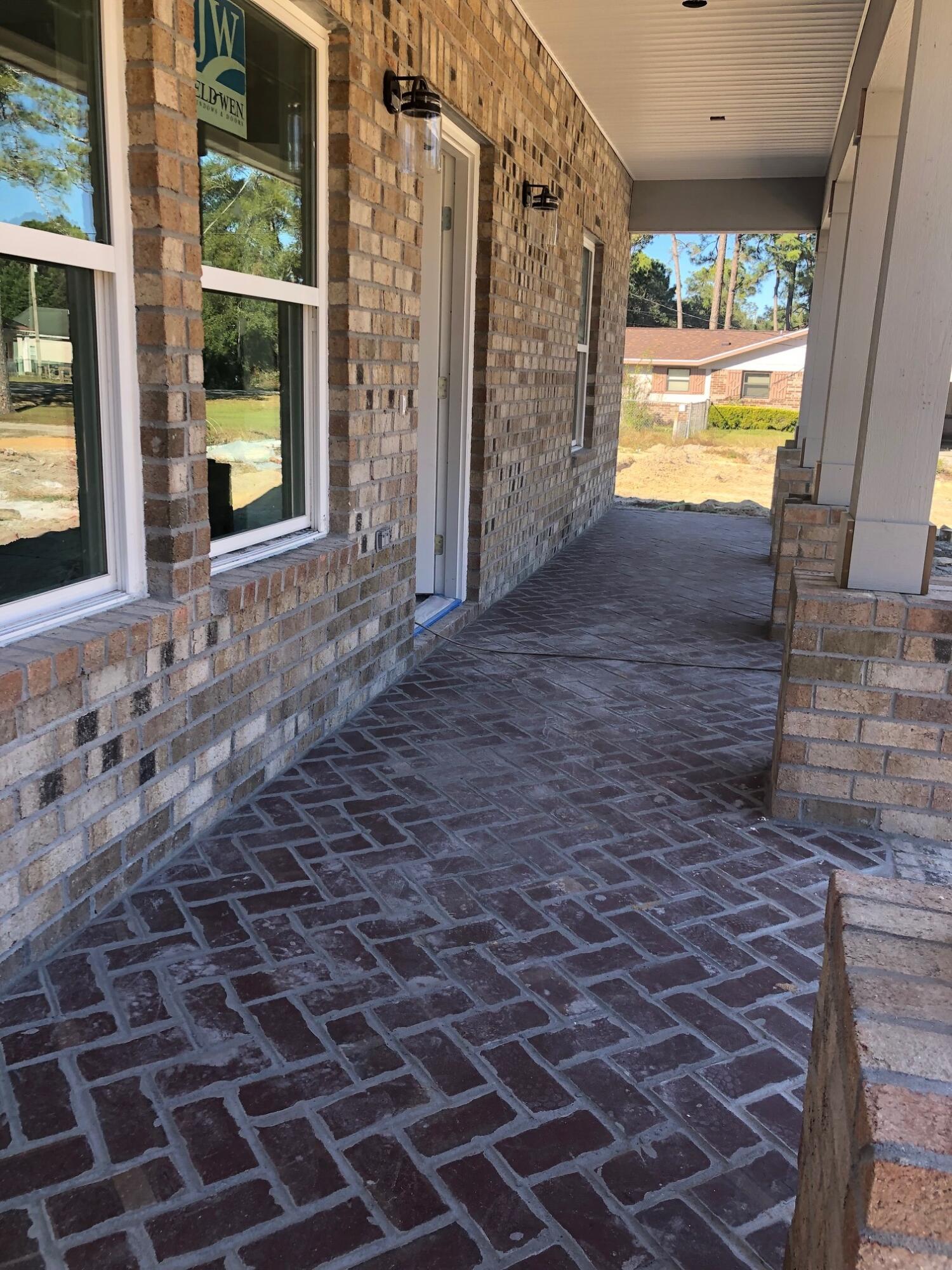 52 Magnolia Street Niceville, FL 32578 - Photo 3 of 16 a view of an empty room with a window