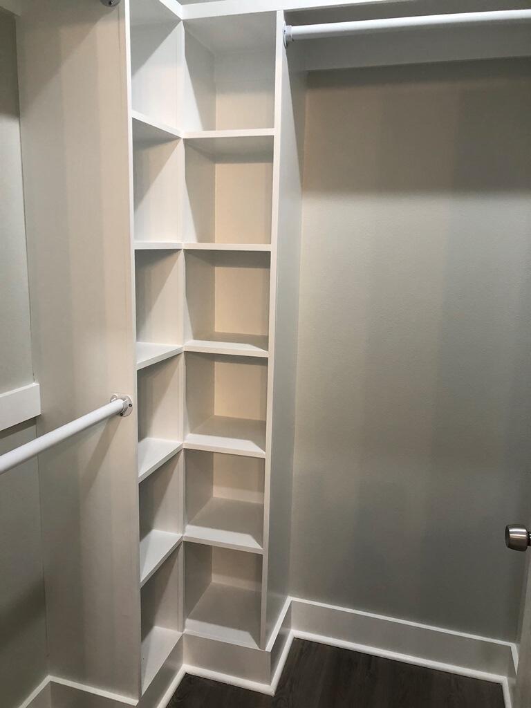 52 Magnolia Street Niceville, FL 32578 - Photo 10 of 16 a view of walk in closet with empty racks