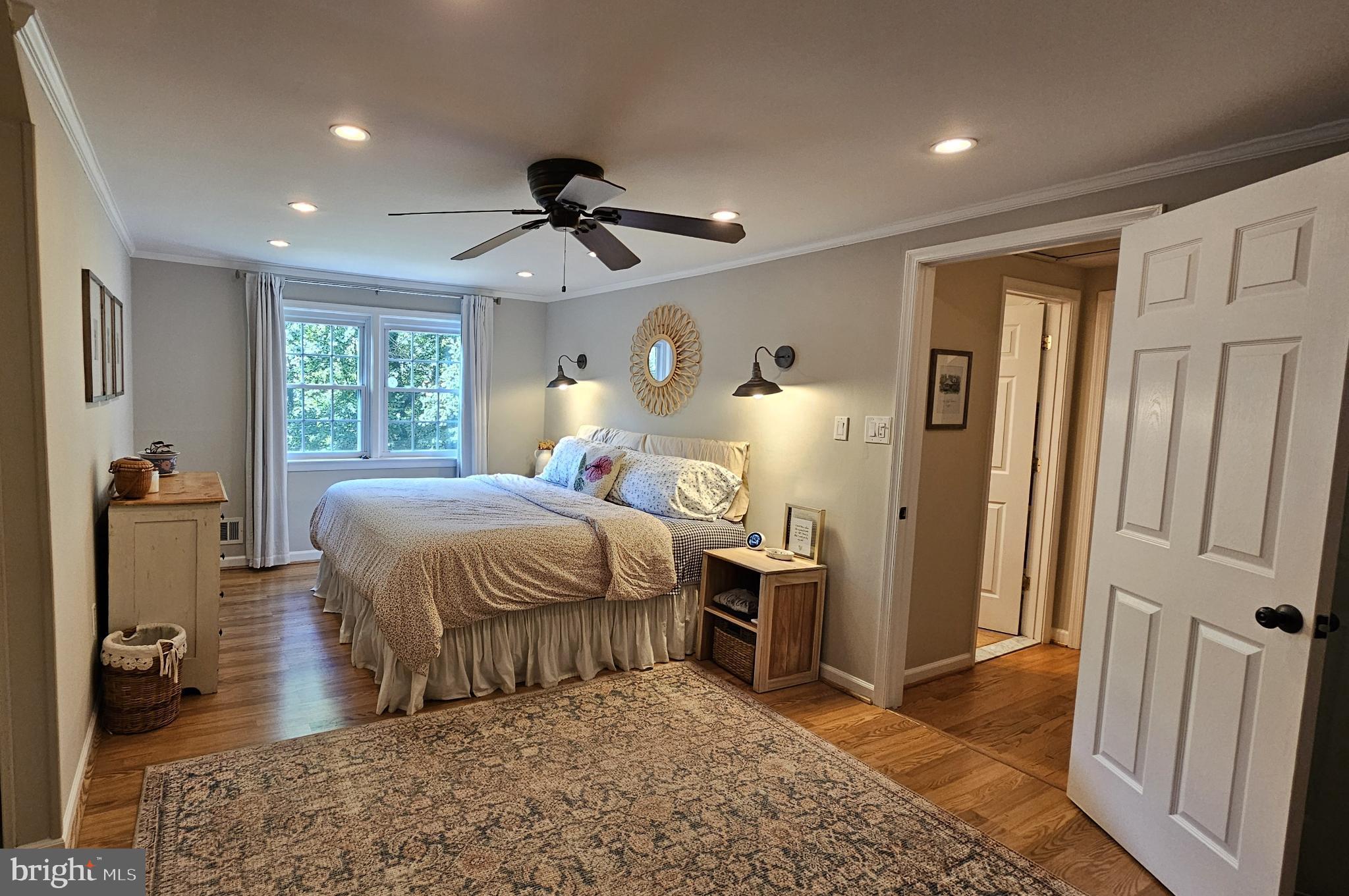 4021 Laurel Road Alexandria, VA 22309 - Photo 15 of 31 a bedroom with a bed and a mirror