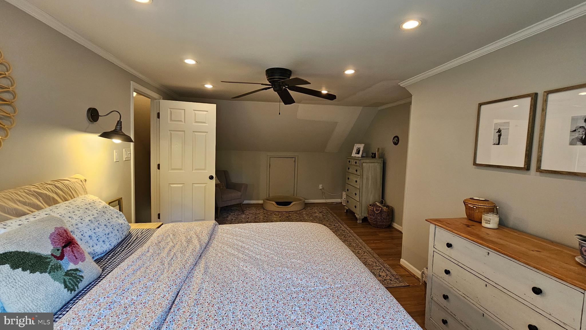 4021 Laurel Road Alexandria, VA 22309 - Photo 16 of 31 a spacious bedroom with a bed and a chandelier