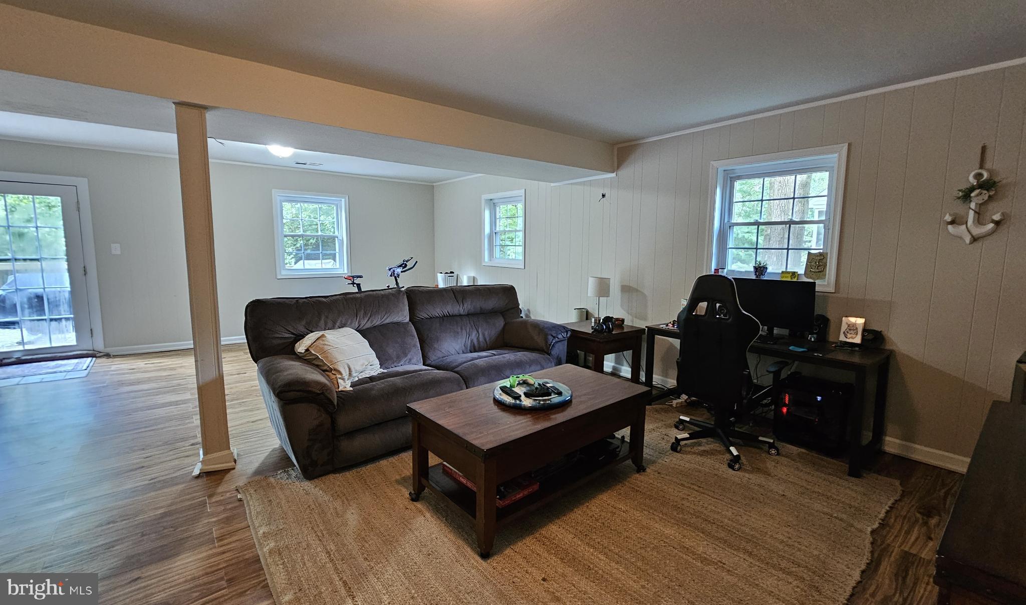 4021 Laurel Road Alexandria, VA 22309 - Photo 22 of 31 a living room with furniture and wooden floor