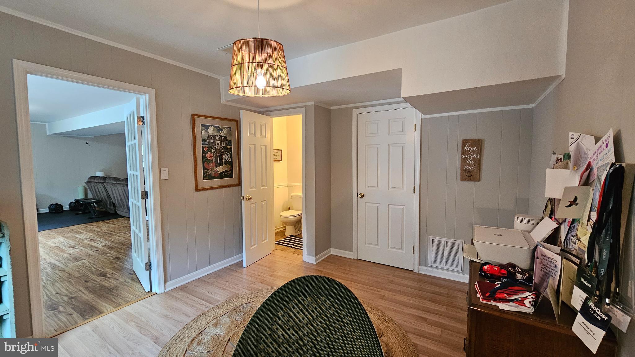 4021 Laurel Road Alexandria, VA 22309 - Photo 26 of 31 a bedroom with a bed and wooden floor