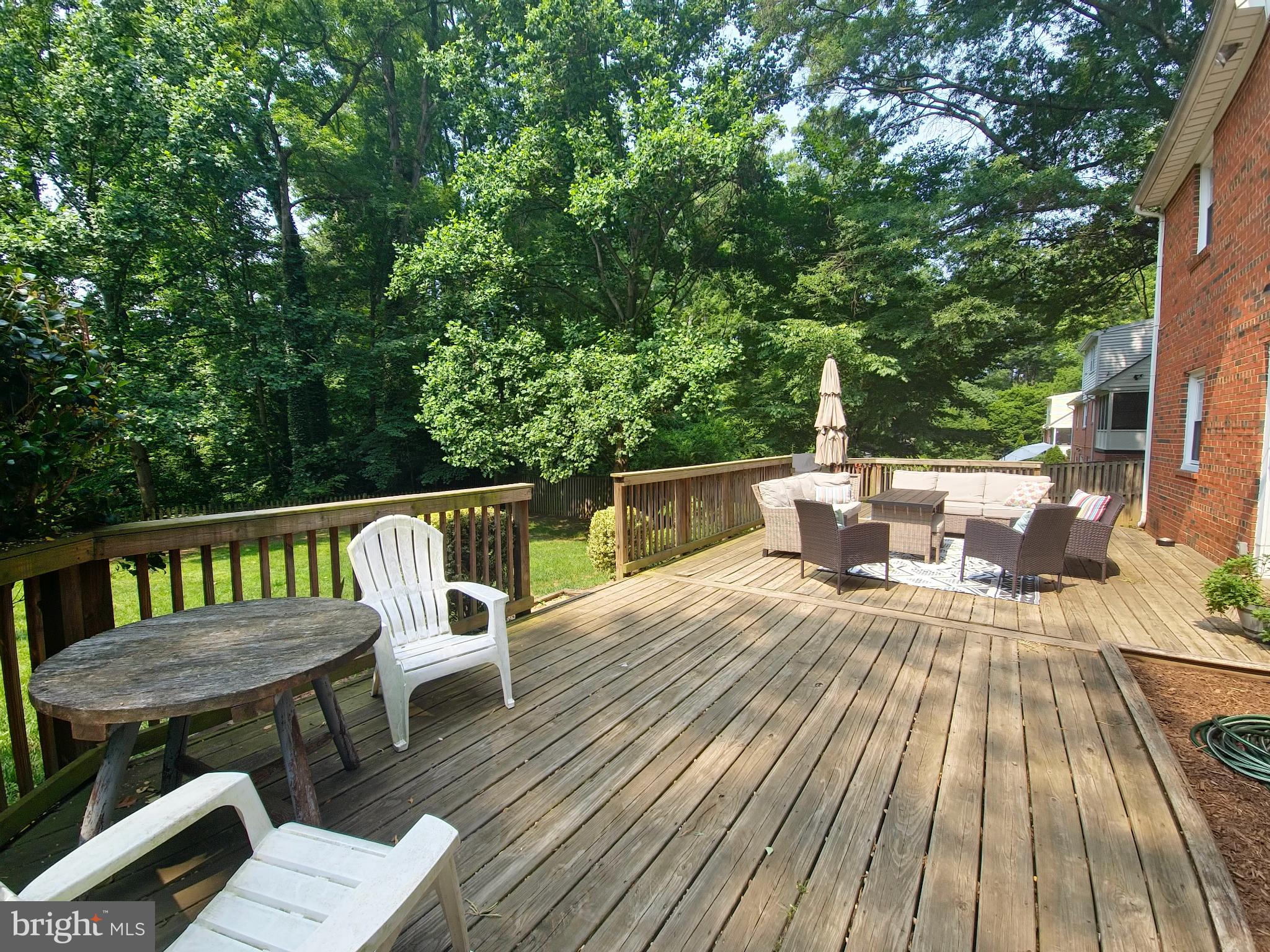 4021 Laurel Road Alexandria, VA 22309 - Photo 27 of 31 a view of deck with furniture and trees in the background