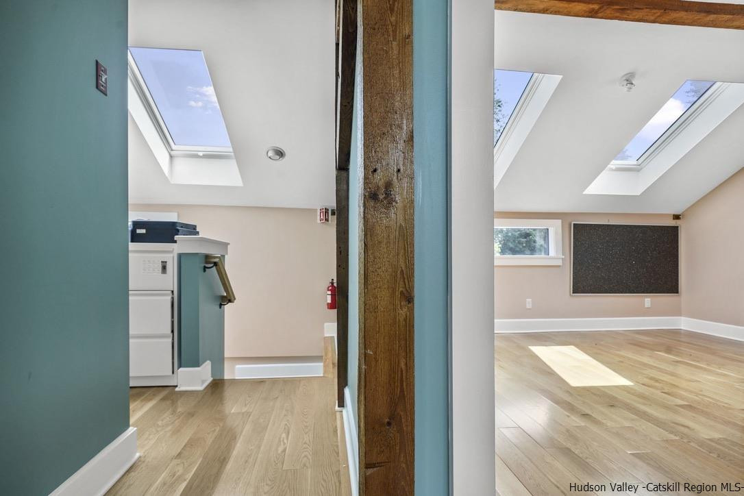 3603-3611 Main Street Stone Ridge, NY 12484 - Photo 16 of 28 a view of hallway with wooden floor