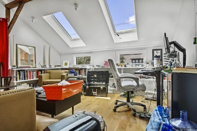 a room with furniture and a flat screen tv