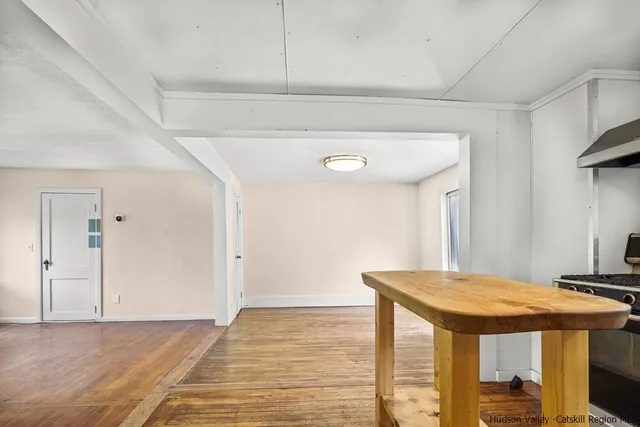 a view of livingroom with furniture and wooden floor