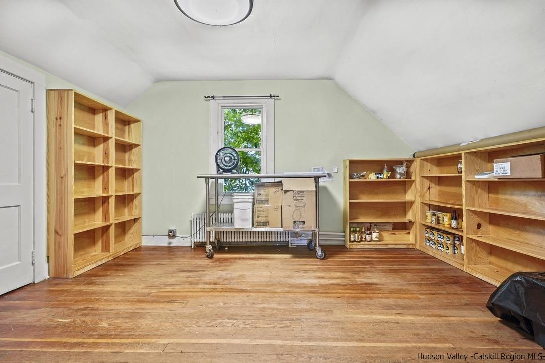 3603-3611 Main Street Stone Ridge, NY 12484 - Photo 24 of 28 a view of a room with wooden floor and closet
