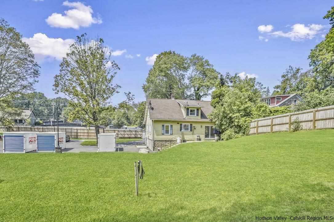 3603-3611 Main Street Stone Ridge, NY 12484 - Photo 25 of 28 a house view with a sitting space and garden