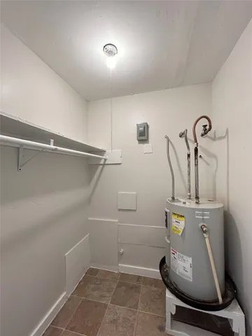 a room with furniture and air hockey table