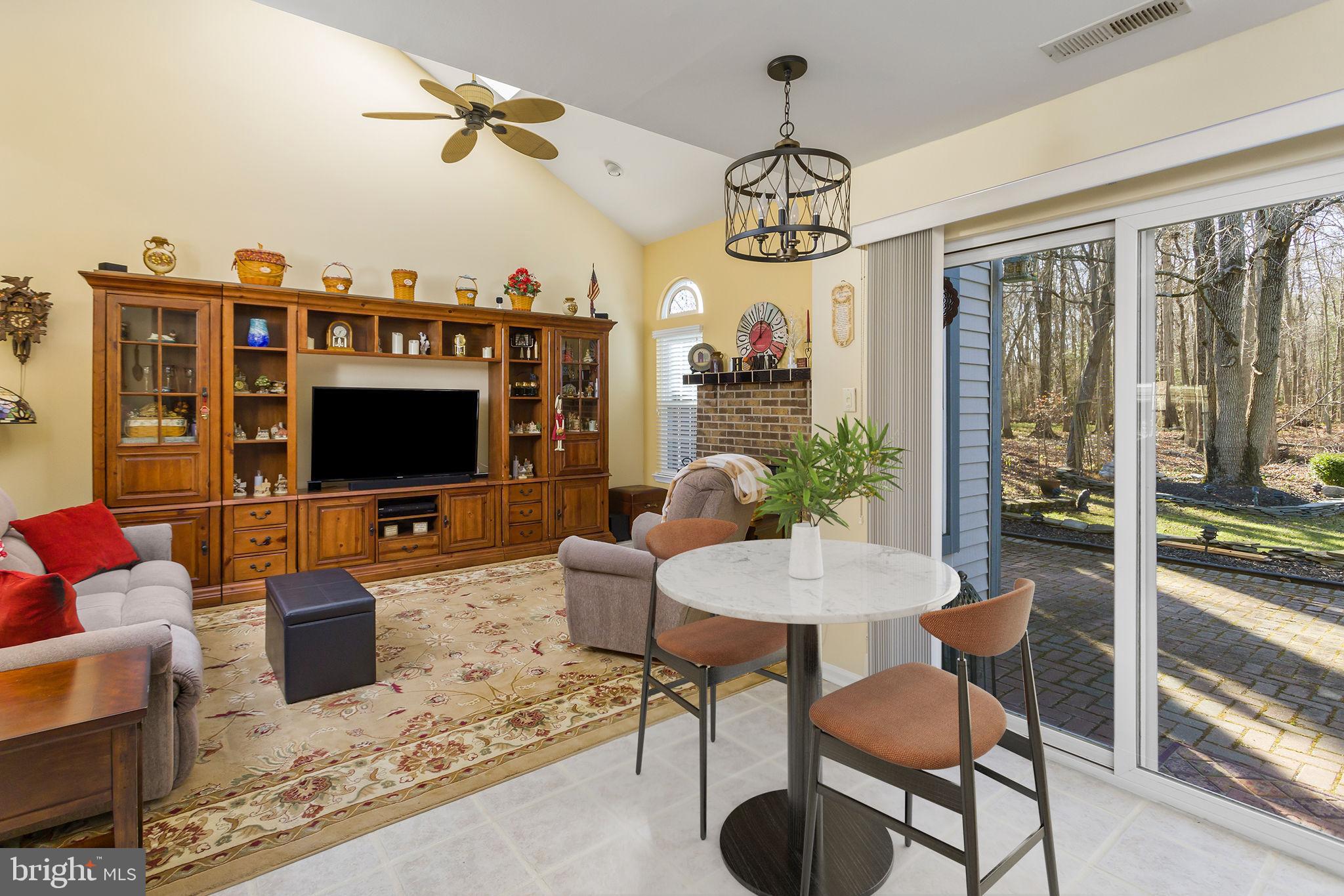 8 Kettlebrook Drive Mount Laurel, NJ 08054 - Photo 16 of 37 a living room with furniture and a flat screen tv