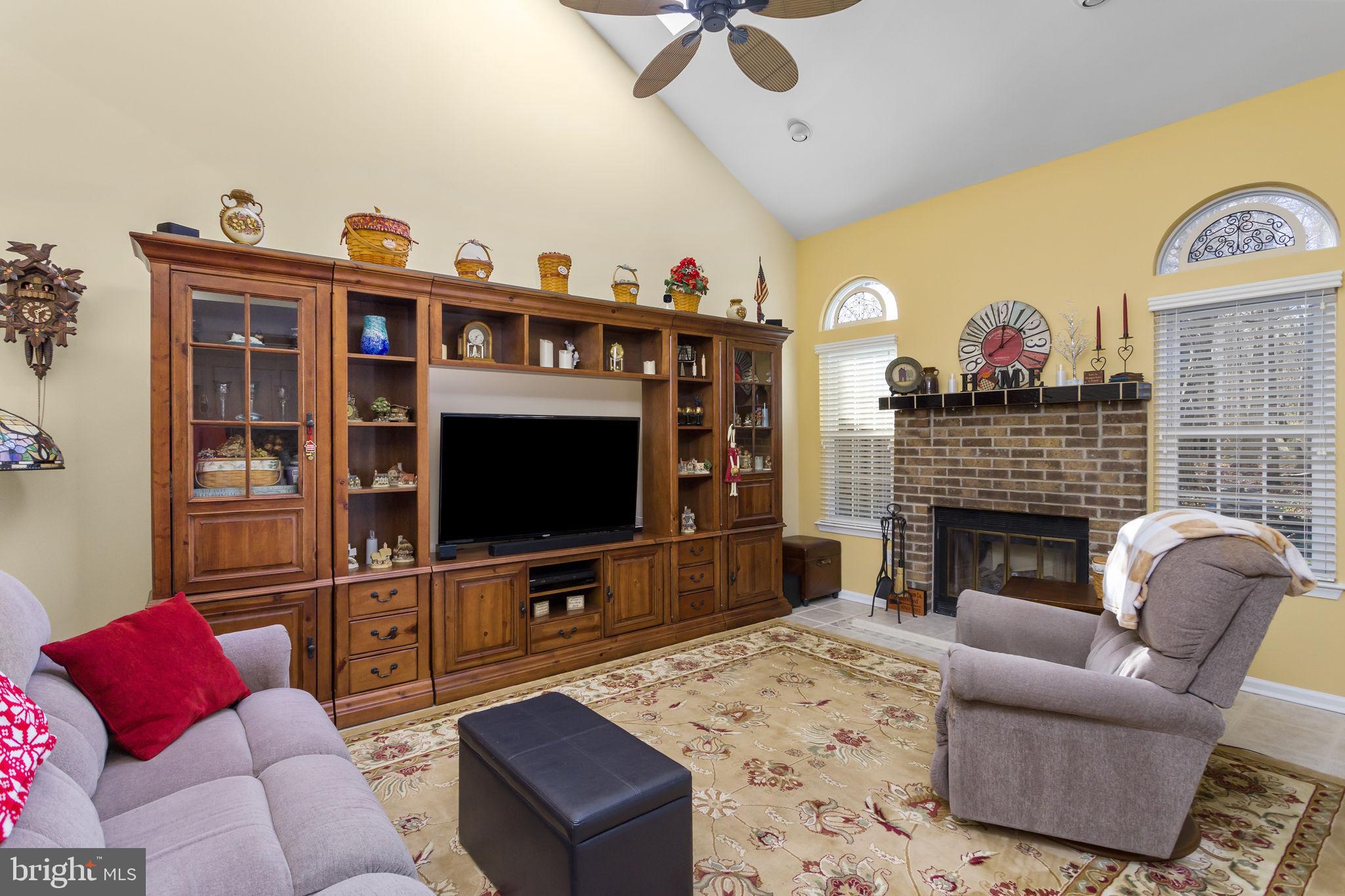 8 Kettlebrook Drive Mount Laurel, NJ 08054 - Photo 18 of 37 a living room with furniture and a flat screen tv