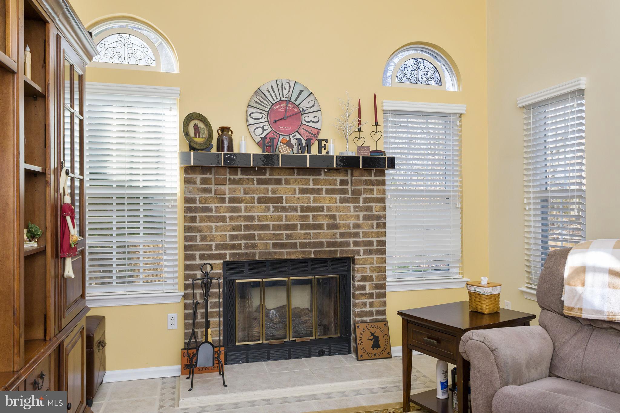 8 Kettlebrook Drive Mount Laurel, NJ 08054 - Photo 19 of 37 a living room with furniture and a fireplace