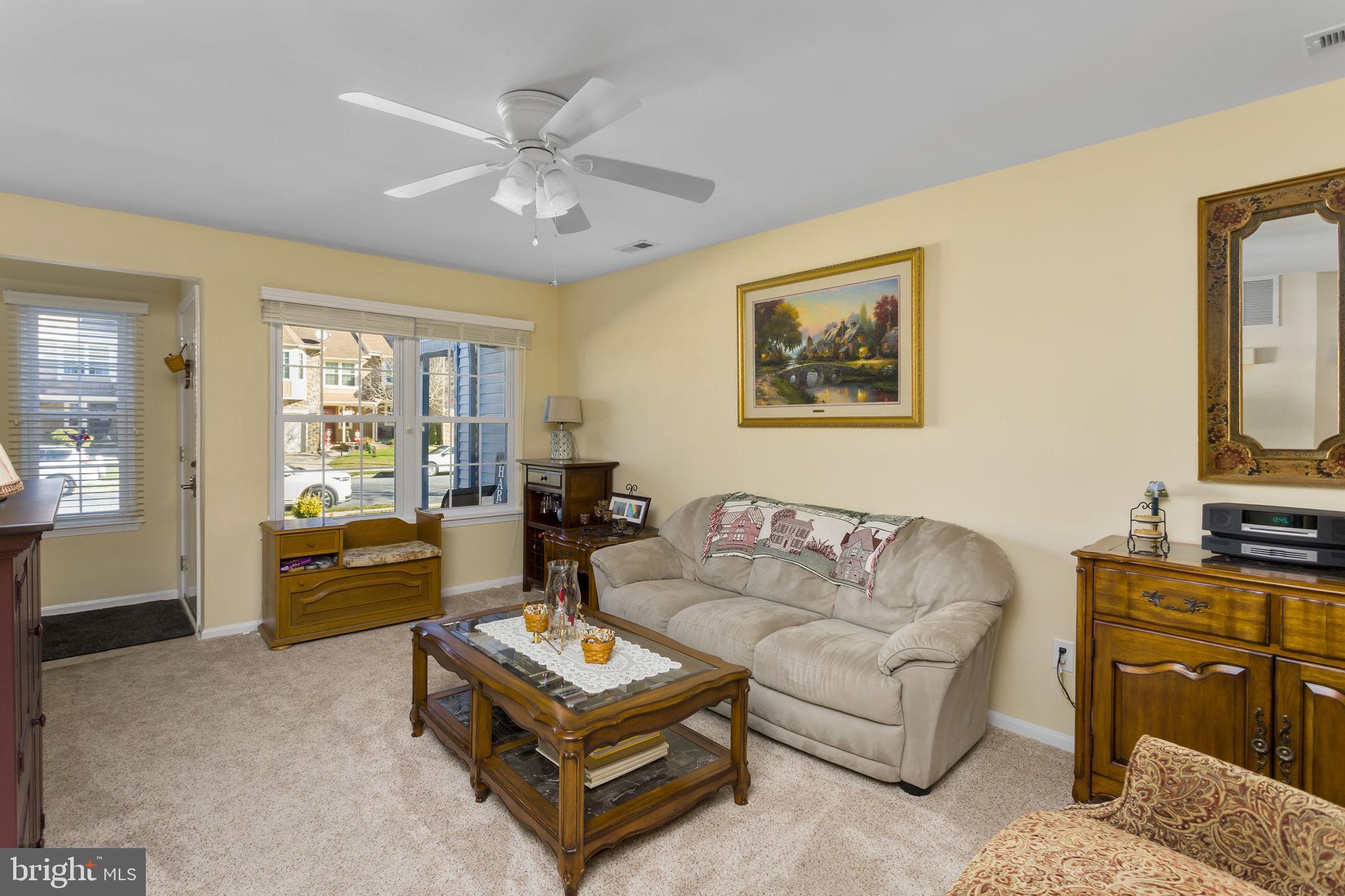 8 Kettlebrook Drive Mount Laurel, NJ 08054 - Photo 7 of 37 a living room with furniture and a flat screen tv